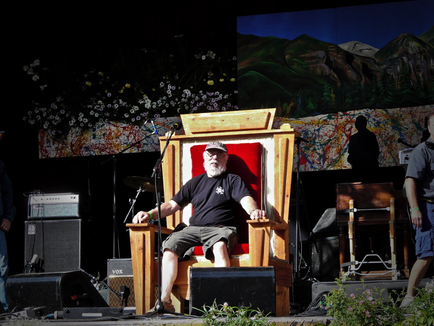 David sitting on the throne on-stage.